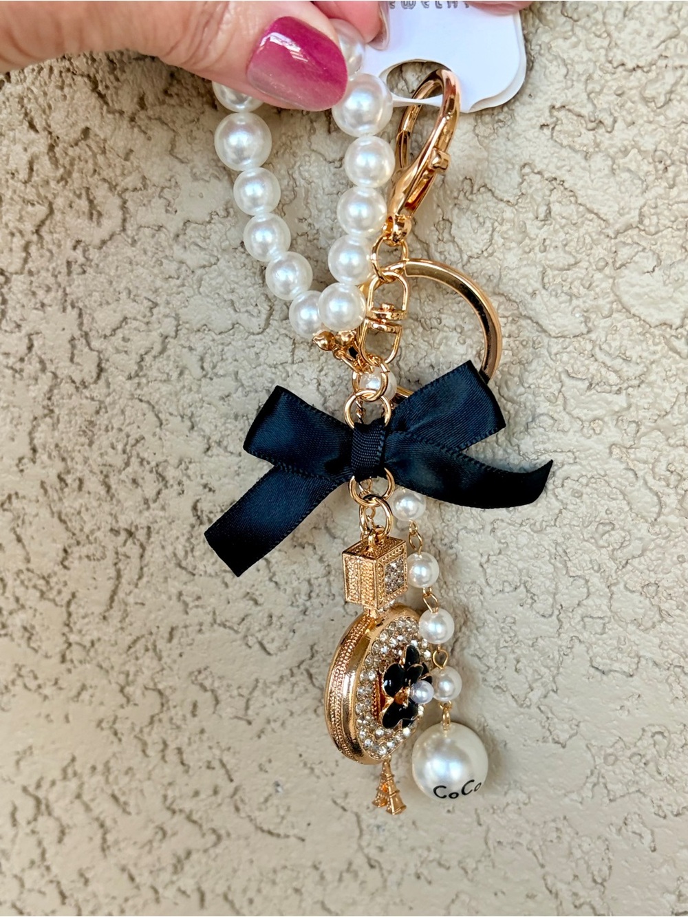 Luxe Gold & Rhinestone Perfume Bottle Ribbon & Pearl Accent Charm Keychain - Picture 7 of 8
